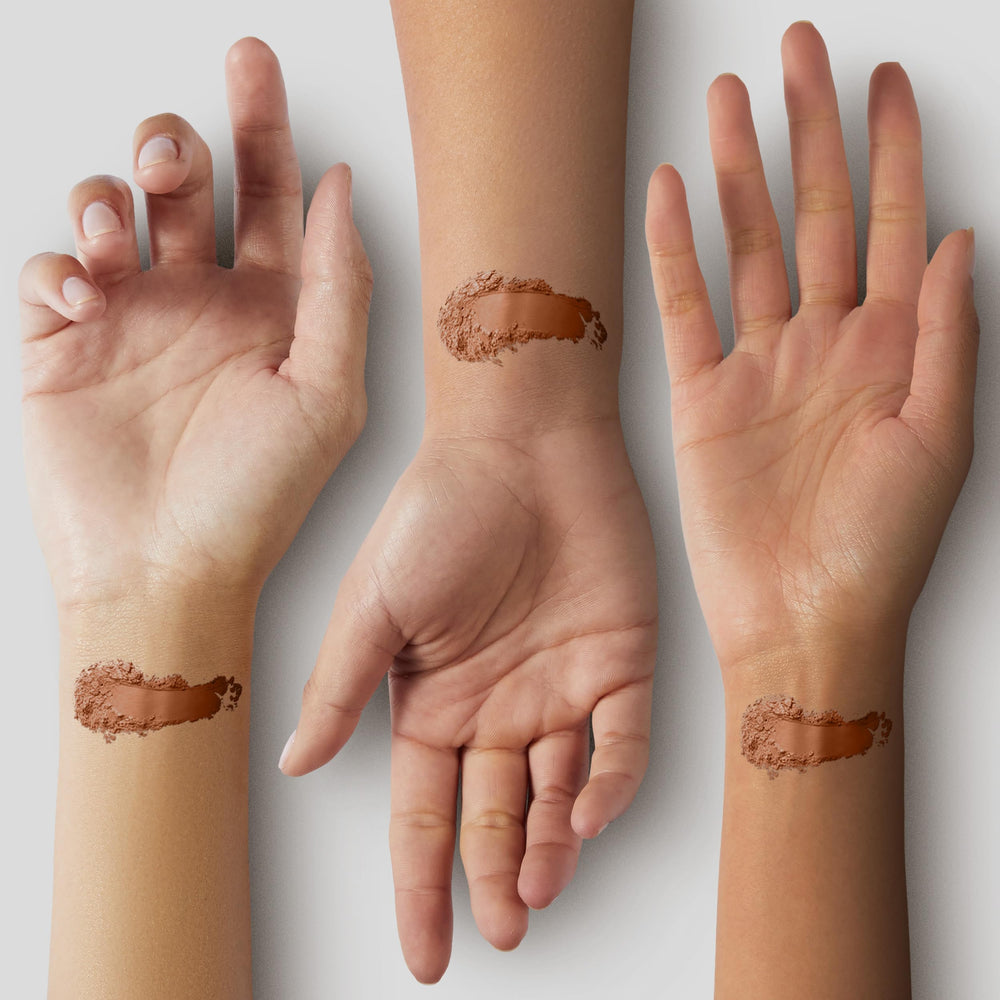 Pure Minerals Lure Minerals Bronze Warmth application on cheeks demonstrates easy blendability