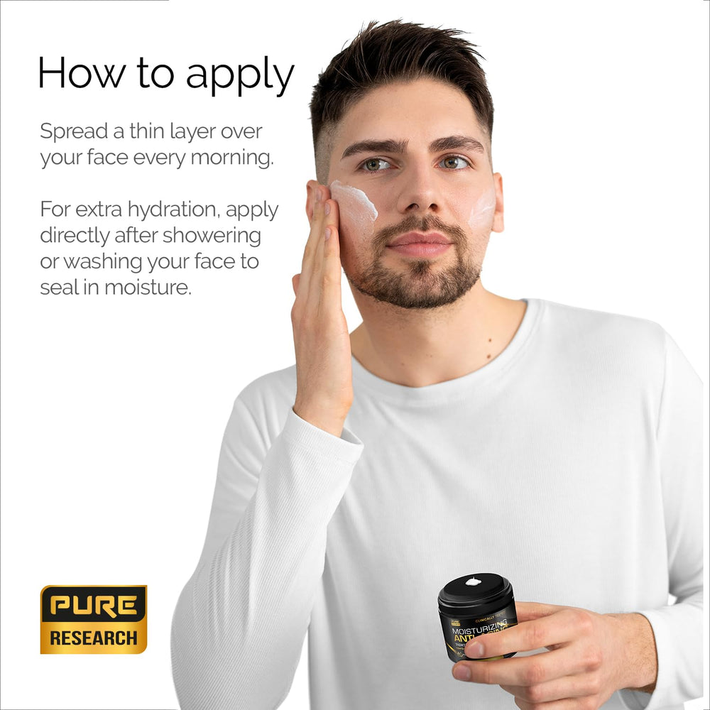 Pure Research men's age-defying cream application on skin for smoothness.
