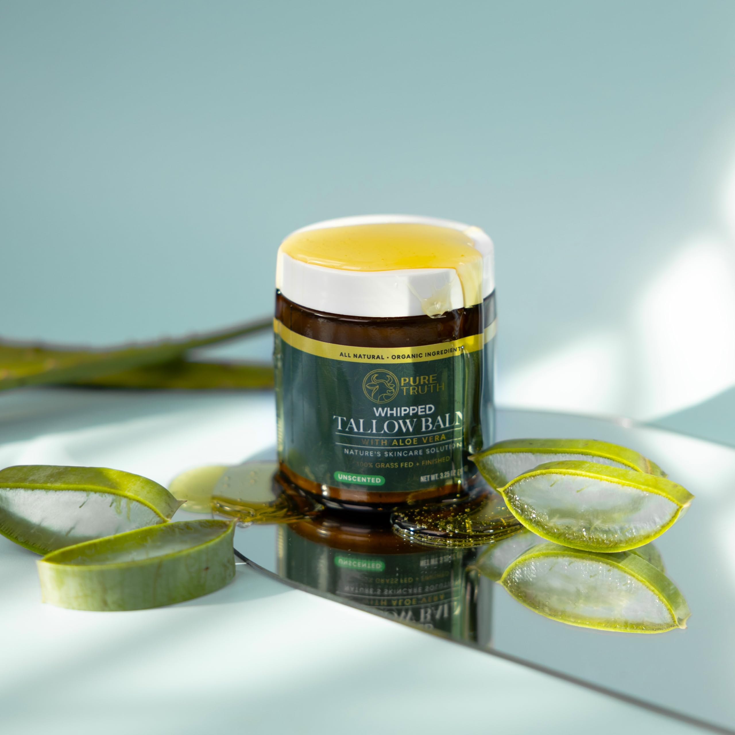 Pure Truth face and body moisturizer in use on skin.
