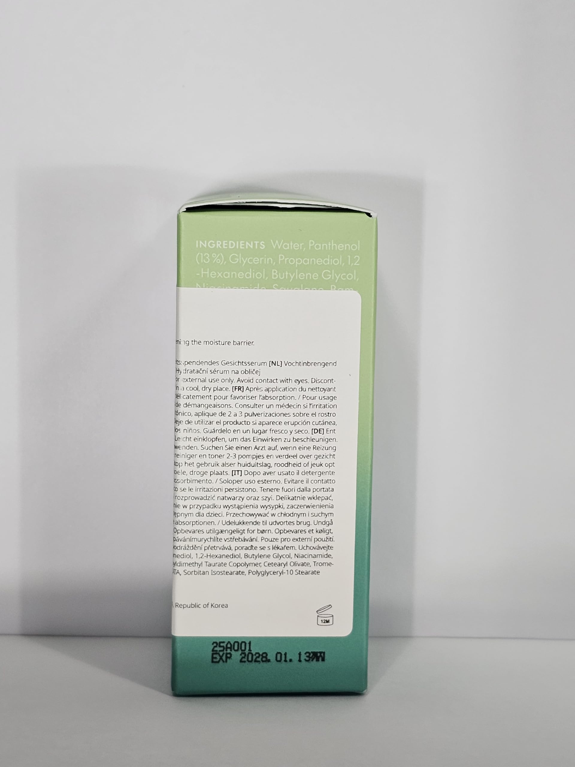 Purito Mighty Bamboo Panthenol Serum glass bottle on vanity for glow