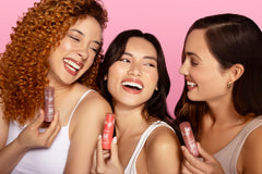 Purlisse Blush Glow lip tint applied for natural, dewy lips.