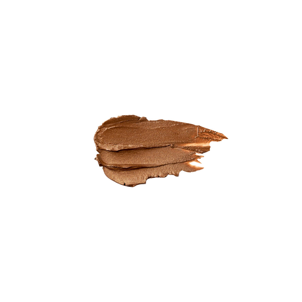 purlisse Vivi Glow BB Bronzer Stick swatch on cheek for radiant, buildable bronze.