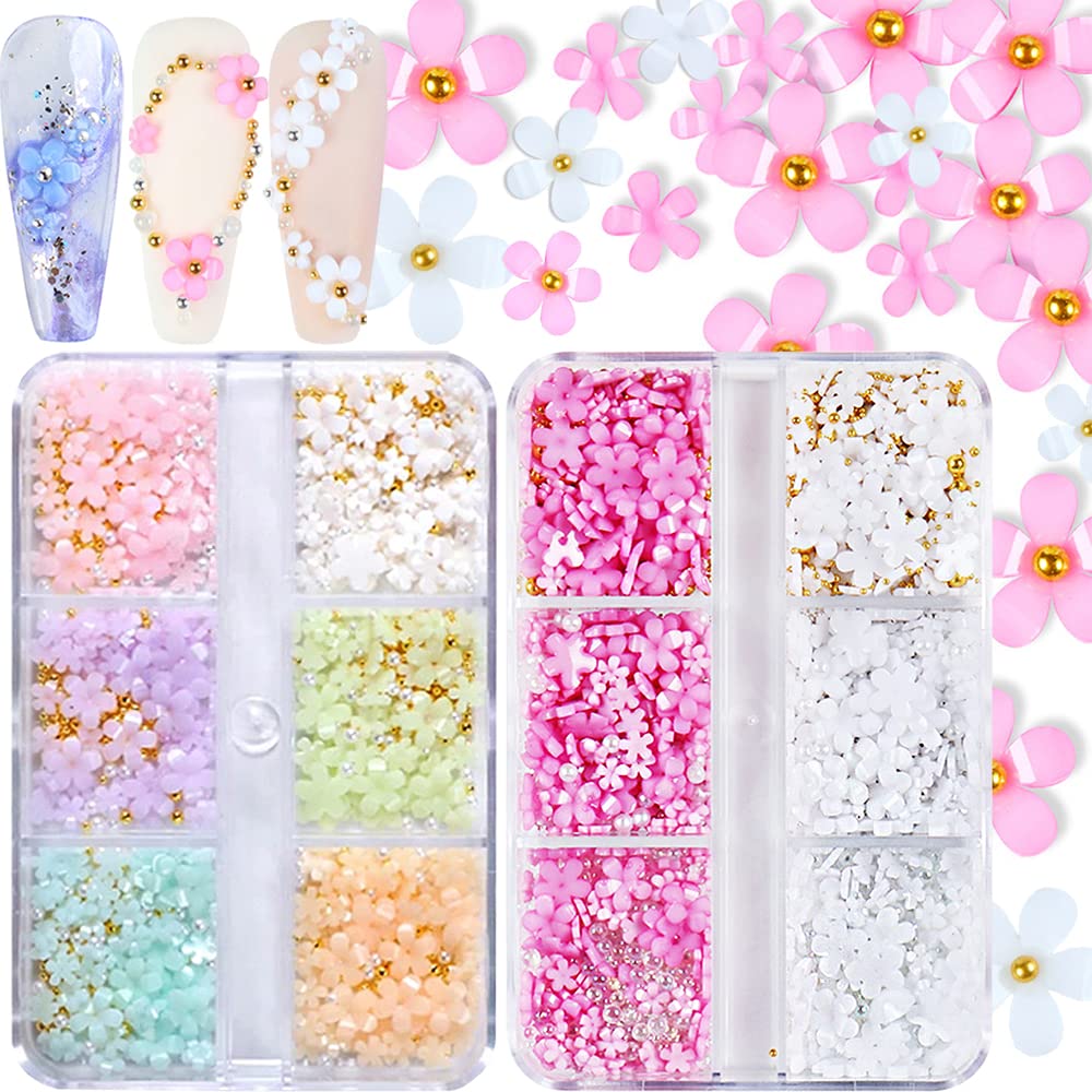 Qdsuh 3D flower nail charms in pink and white for elegant nail art designs.