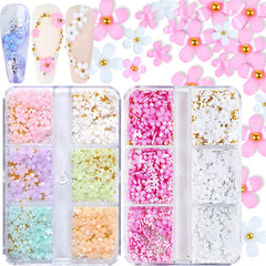Qdsuh 3D flower nail charms in pink and white for elegant nail art designs.