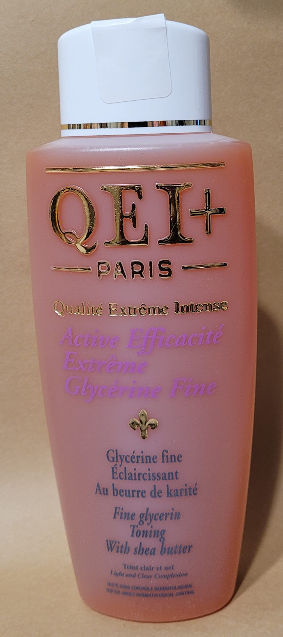 QEI+ Paris Active glycerine bottle showcases hydrating formula for radiant skin.