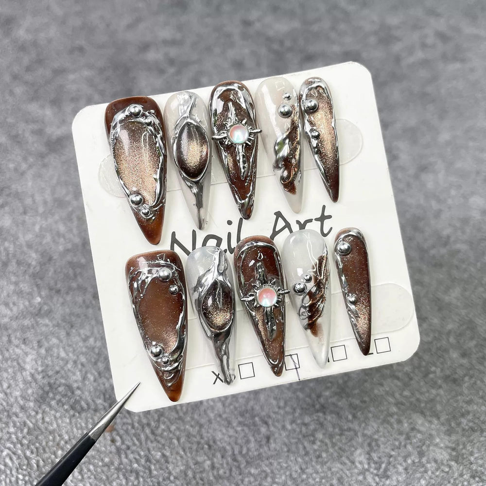 Qicaijia embossed swirl design nails add tactile luxury and shimmer