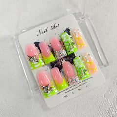 Qicaijia luxury press-on nails in long duck design with a glossy green finish, ideal for at-home manicures