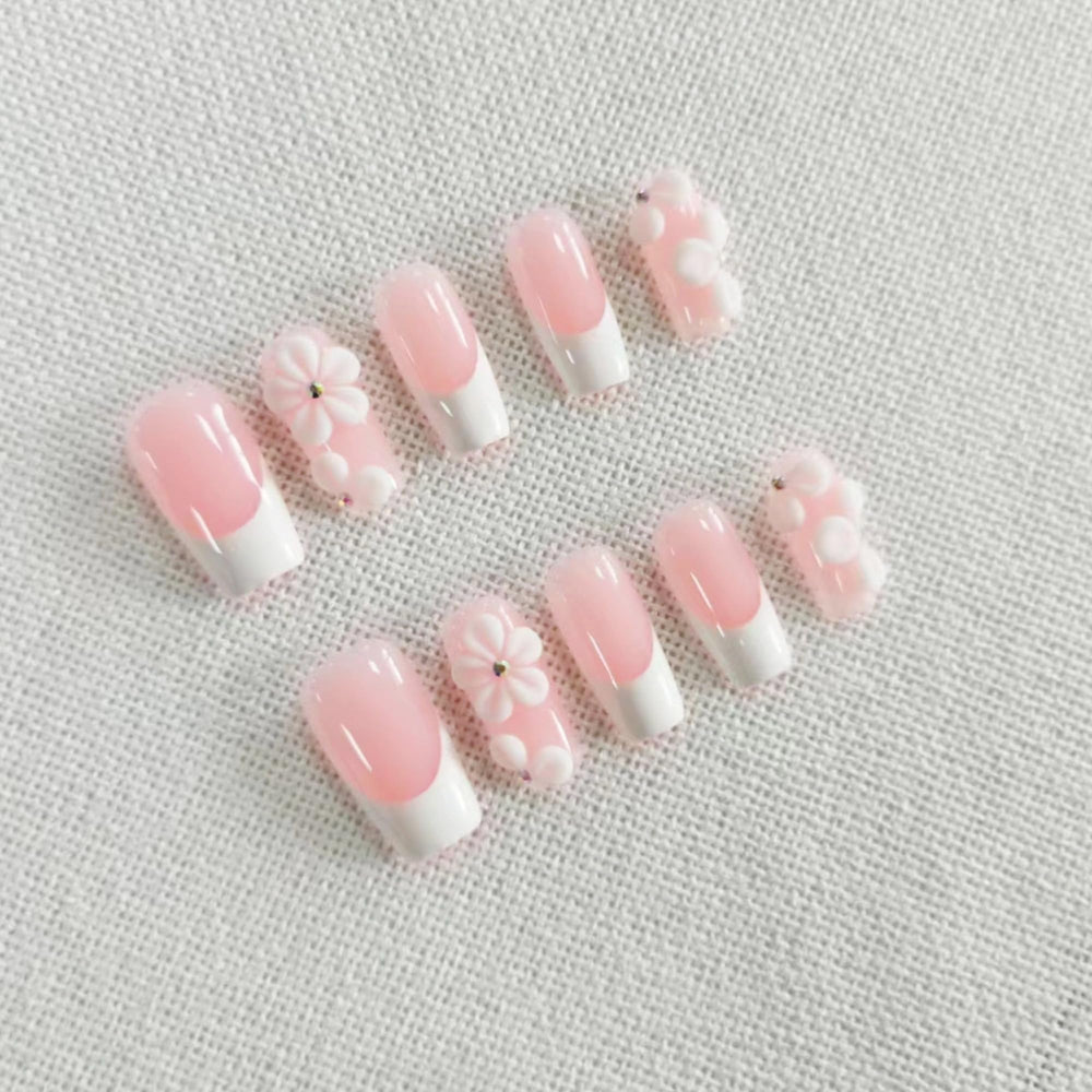 Qicaijia rhinestone-embellished nails add subtle sparkle for special occasions.