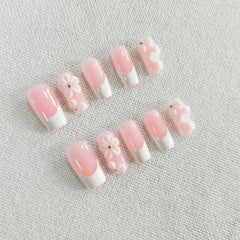 Qicaijia rhinestone-embellished nails add subtle sparkle for special occasions.