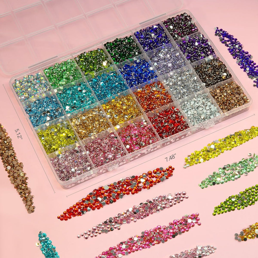 Qiipii tweezers and wax pens included to pick up and place gems.