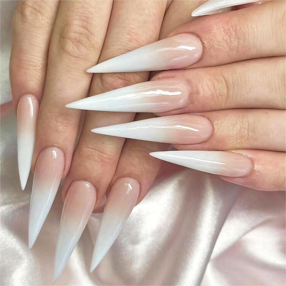 QQPPOLIU extra-long stiletto nails in pink-to-white gradient for a salon-like manicure.