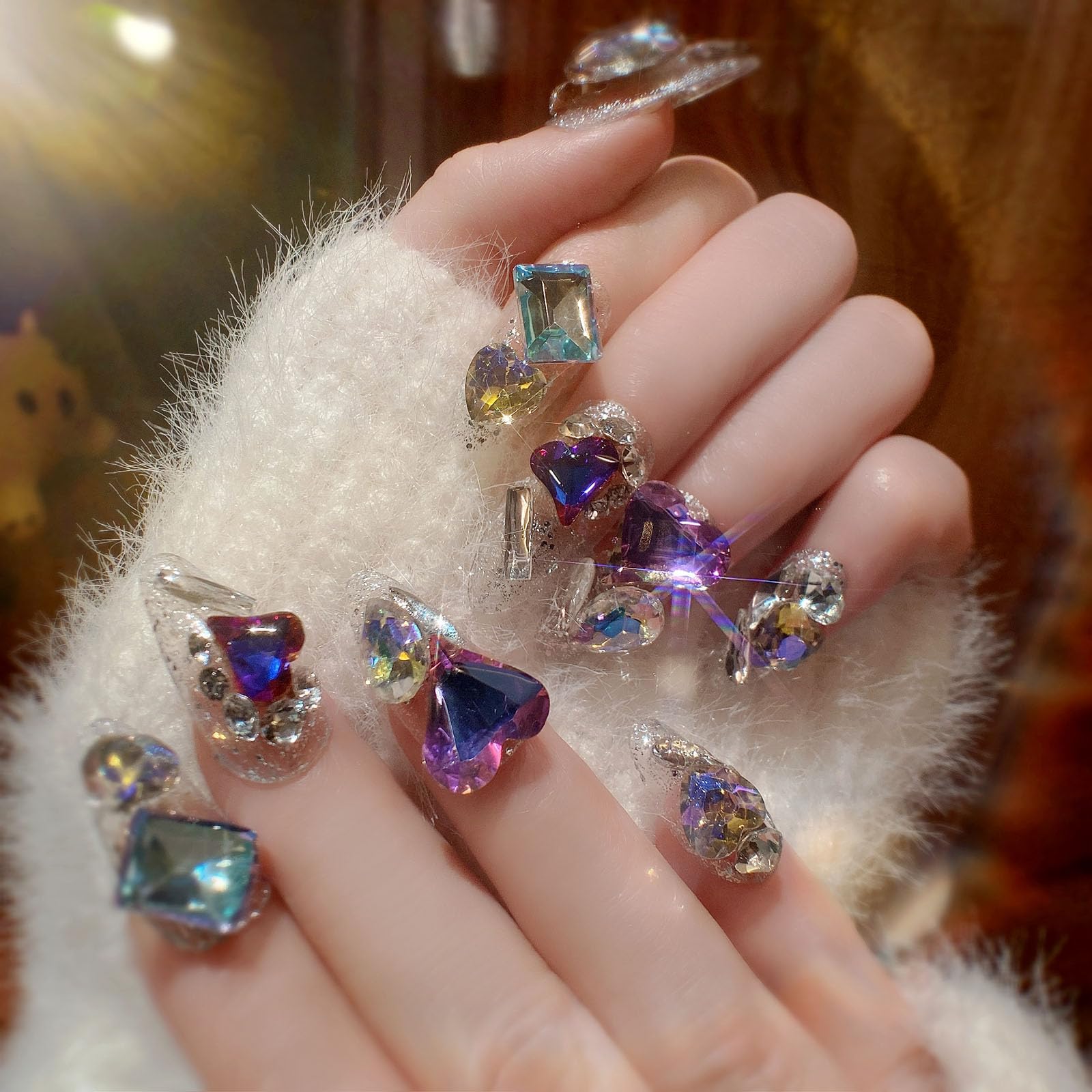 QQPPOLIU full-cover nails in silver glitter create a bold, long-lasting look.