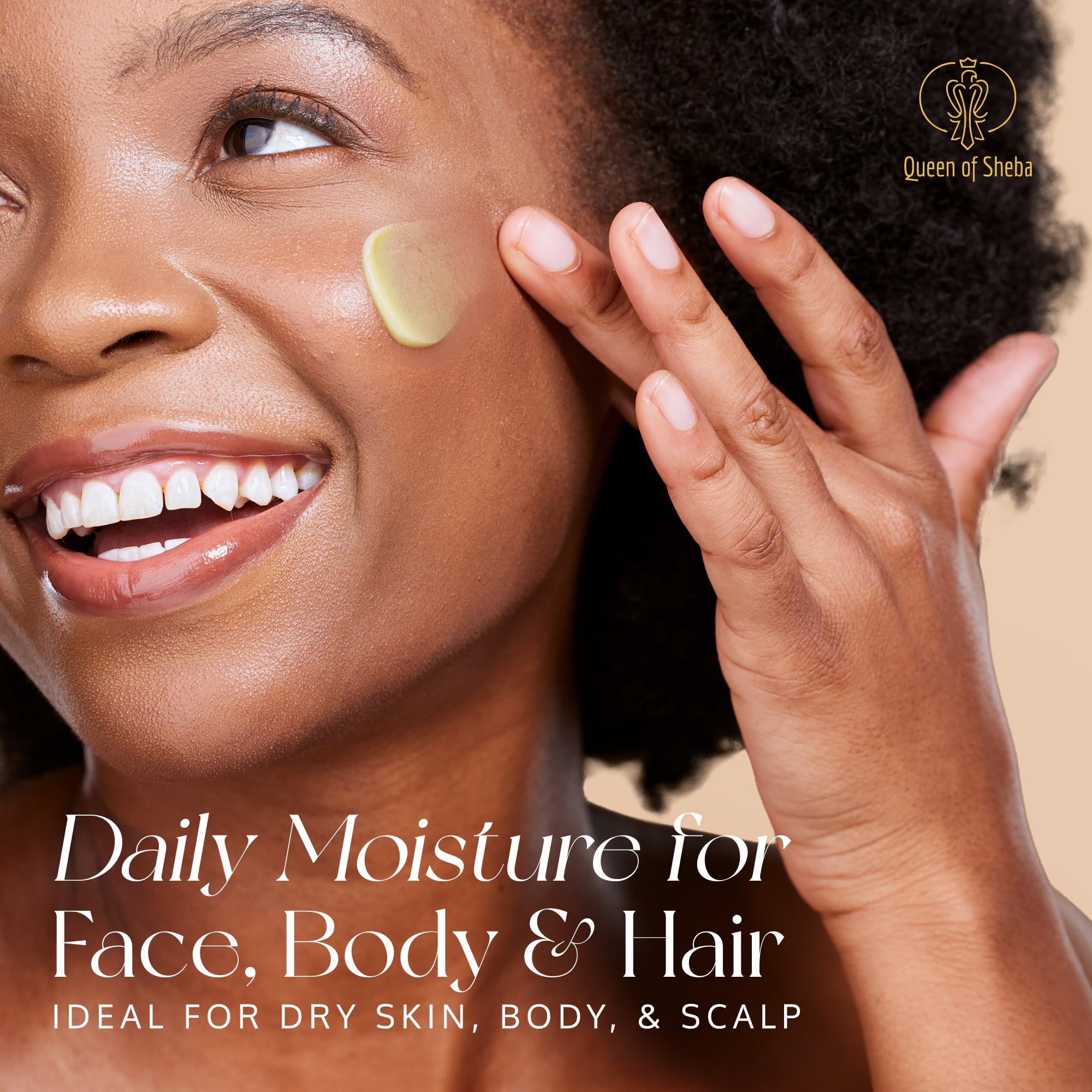 Hand applying Queen of Shea cherry blossom butter for daily skin hydration