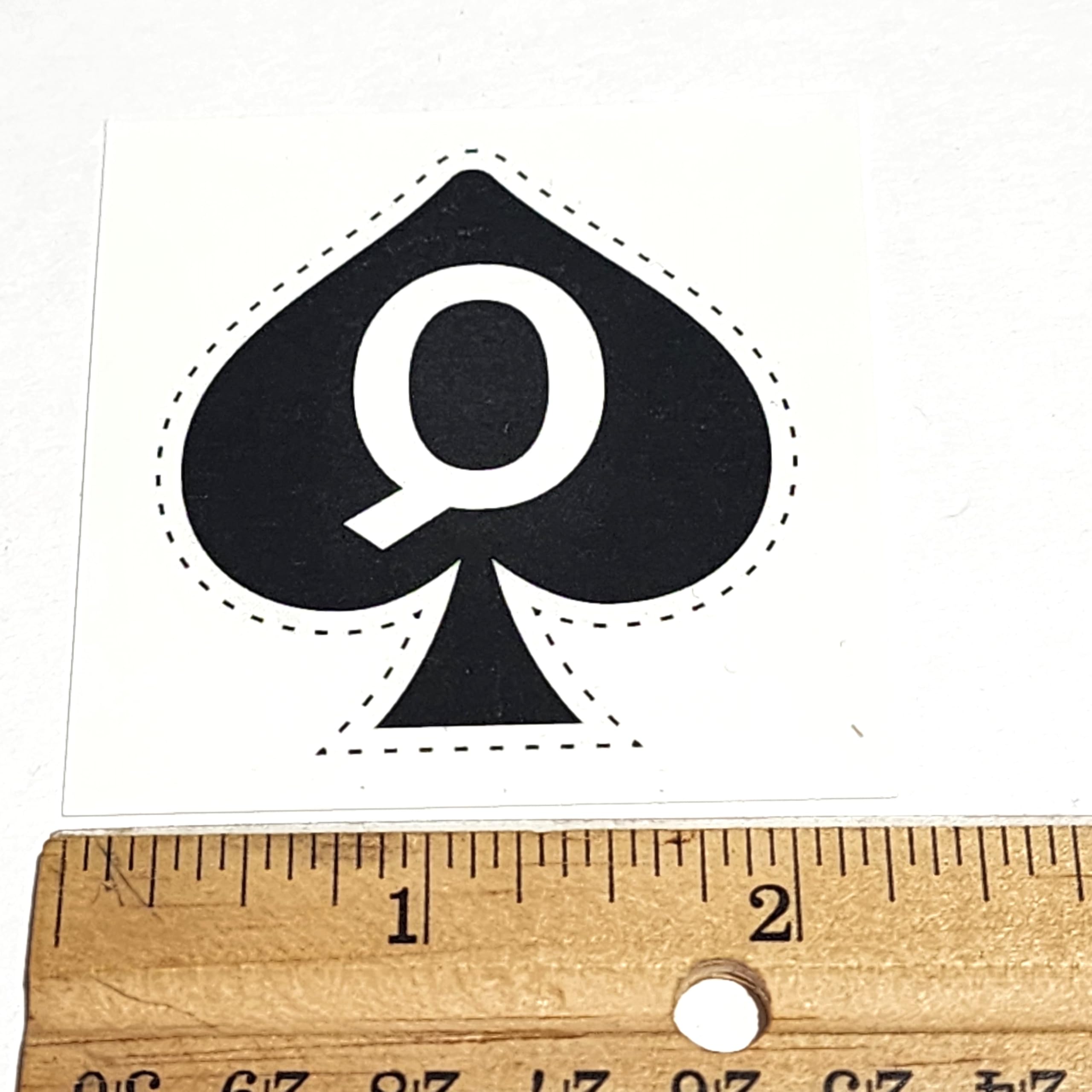 Queen of Spades tattoo on shoulder shot, bold accent with easy removal