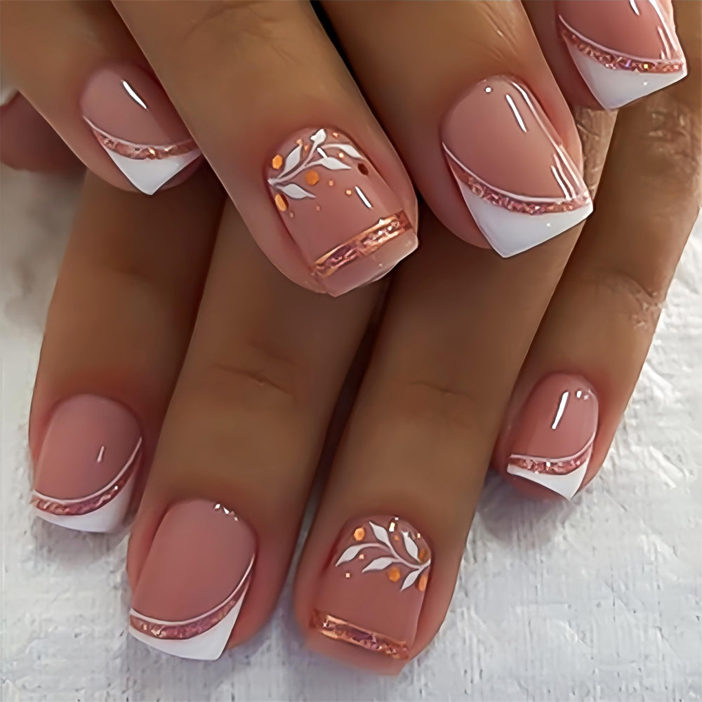 Quezadyl rose gold glitter French tips for quick at-home glam.