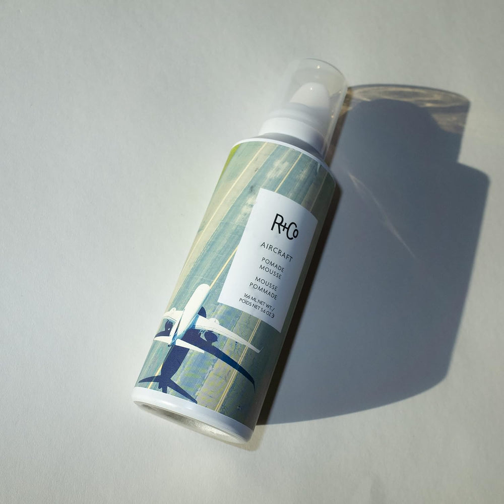 R+CO Aircraft Pomade Mousse foam texture aids wave and curl definition.
