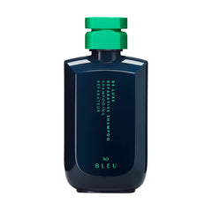R+Co BLEU De Luxe reparative shampoo bottle promoting deep hydration for damaged hair.