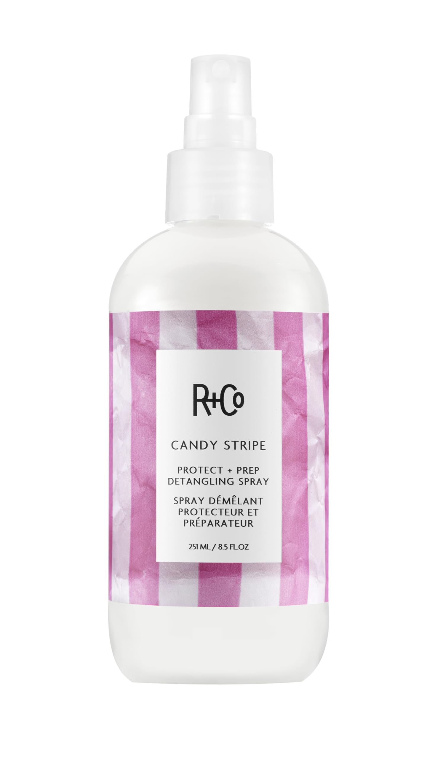 R+Co Candy Stripe Protect + Prep Detangling Spray bottle-dispense for quick detangling.