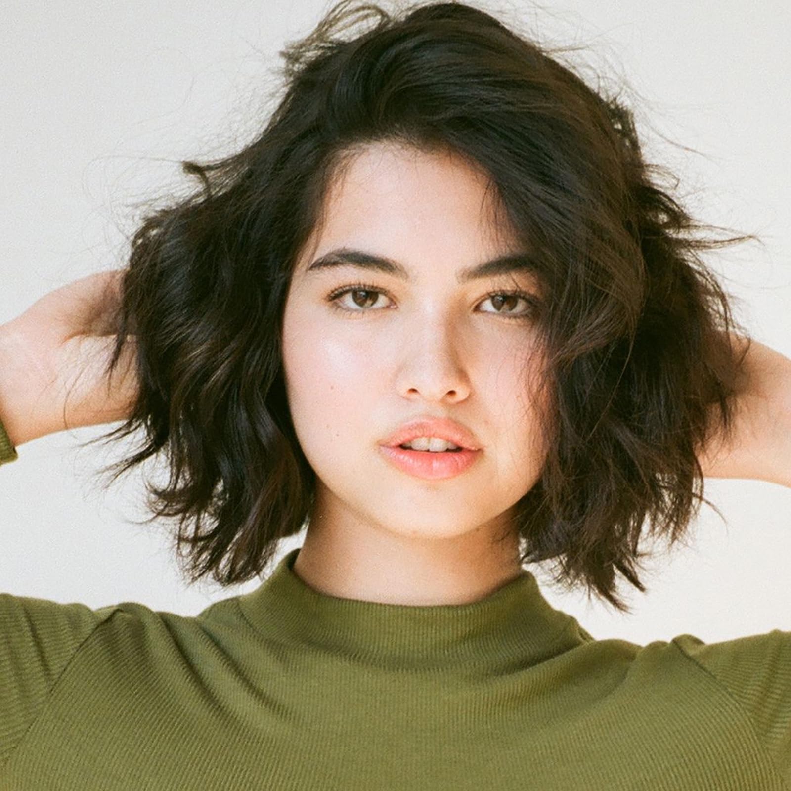 R+Co Cool Wind pH formula close-up highlights frizz taming capability.
