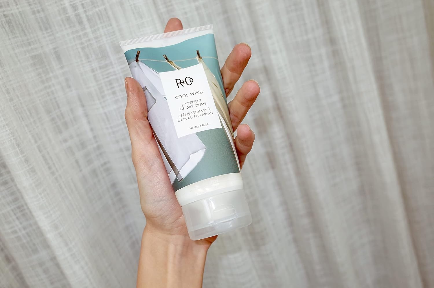 R+Co Cool Wind texture close-up reveals hydrating formula and smooth results.