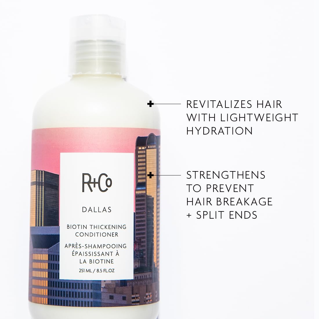 Close-up of R+Co Dallas Biotin Thickening Conditioner pour for easy application.