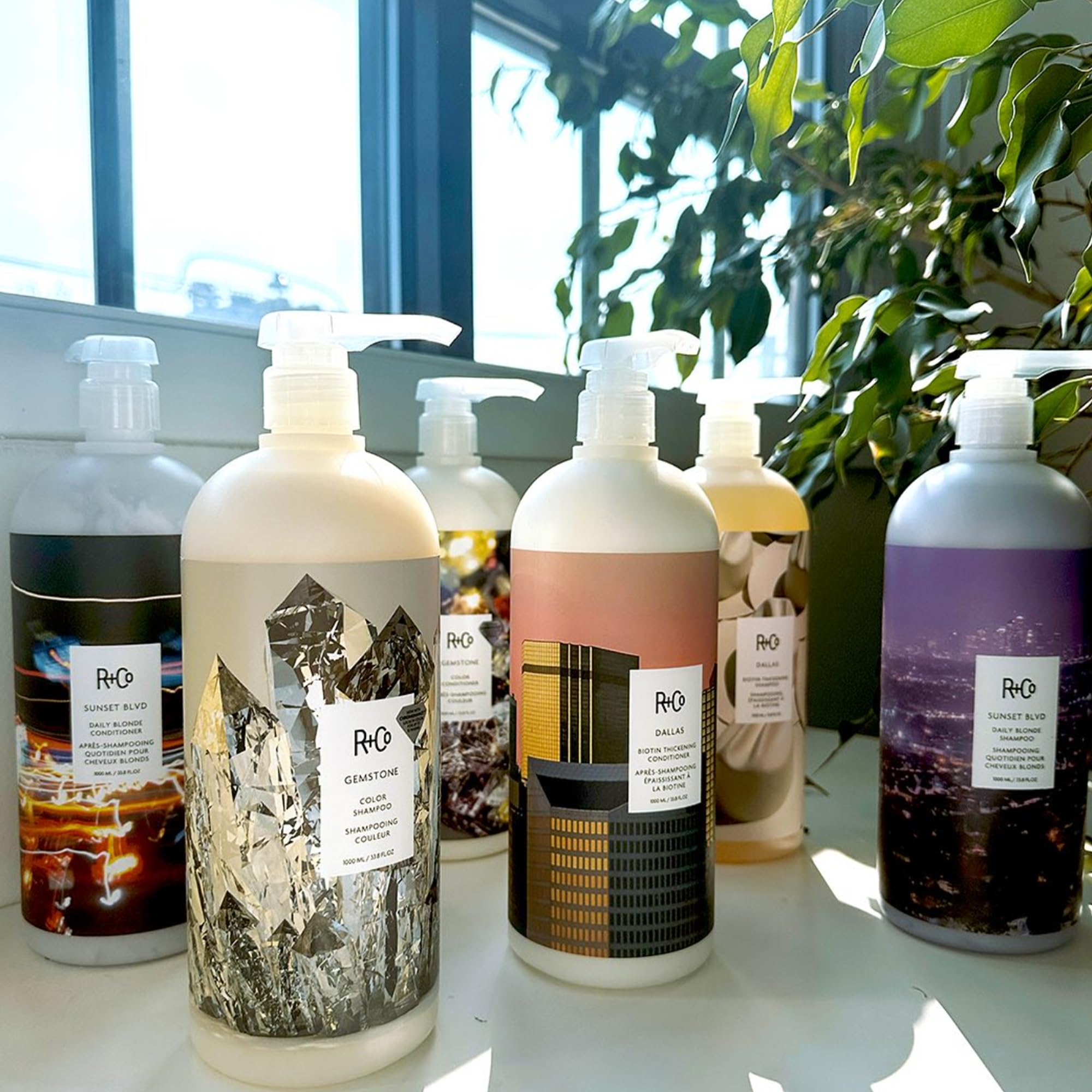 R+Co Gemstone Color Conditioner bottle close-up emphasizes scalp balance