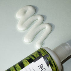 R+Co Labyrinth shampoo lather closeup shows gentle cleansing for a fresh, textured look.