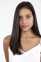 Moon Landing spray demonstrating frizz control for smooth hair.