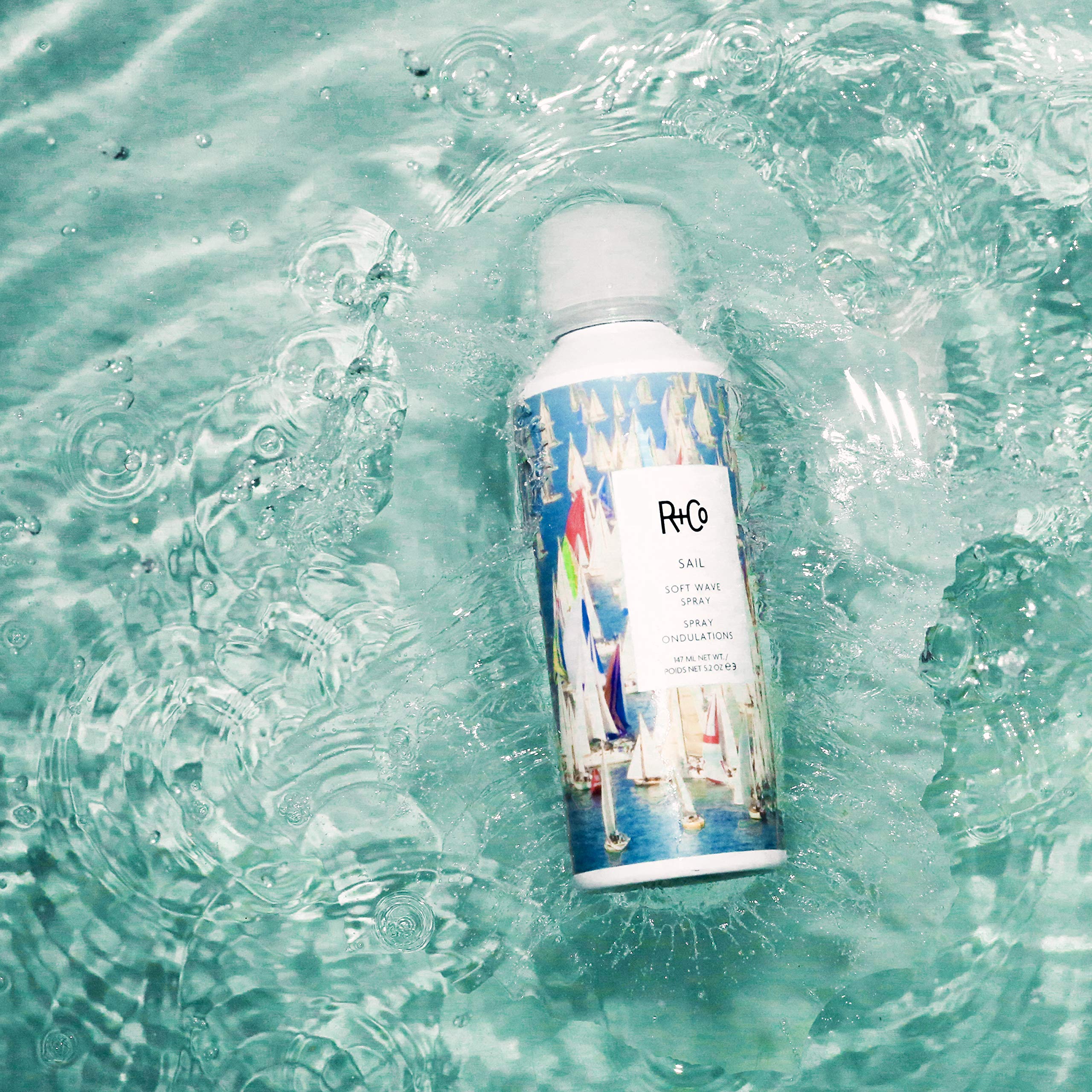 R+Co Sail Soft Wave Spray creating natural waves and texture in hair
