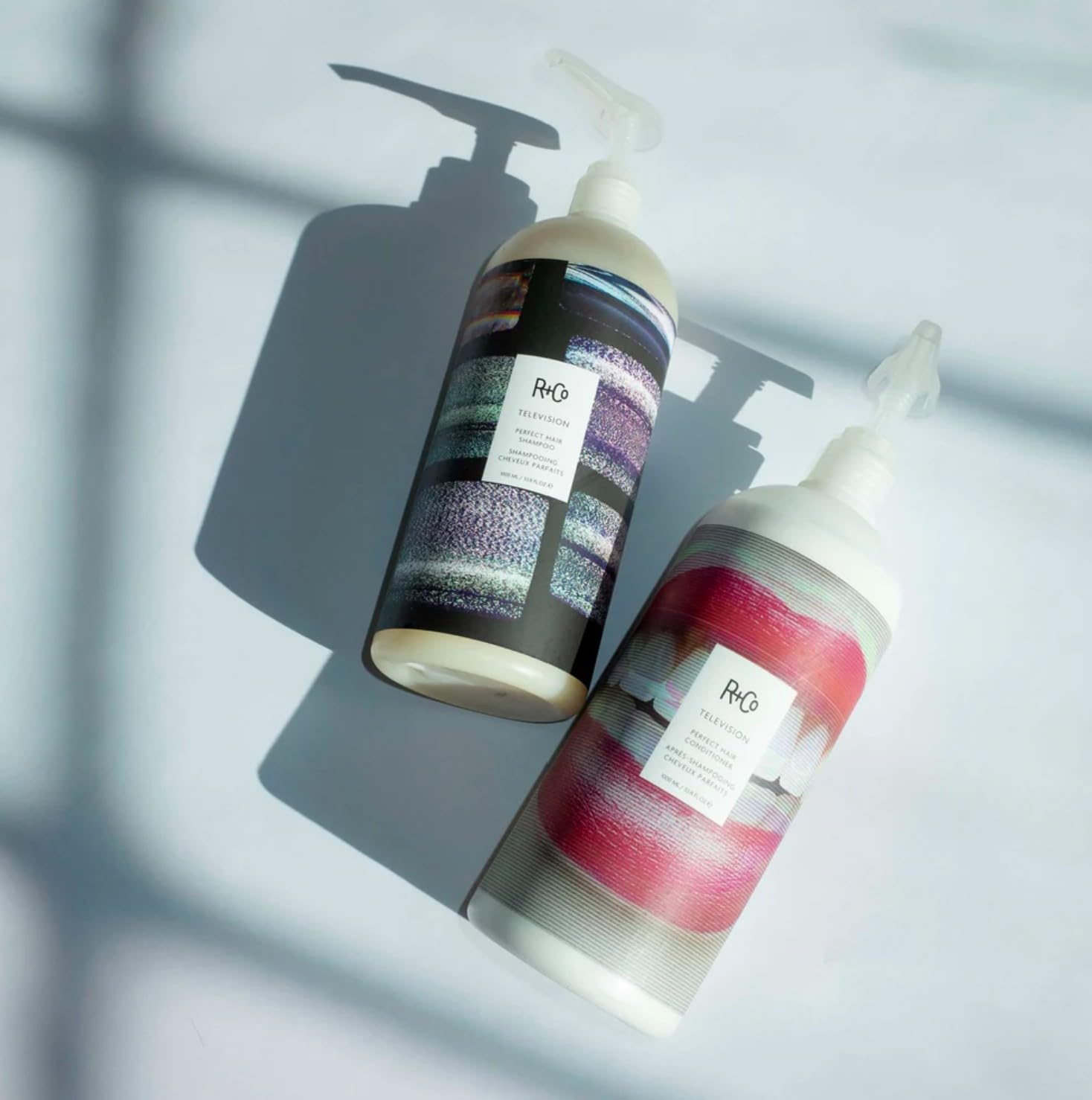 R+Co Television Conditioner dispensed for smooth detangling and shine.