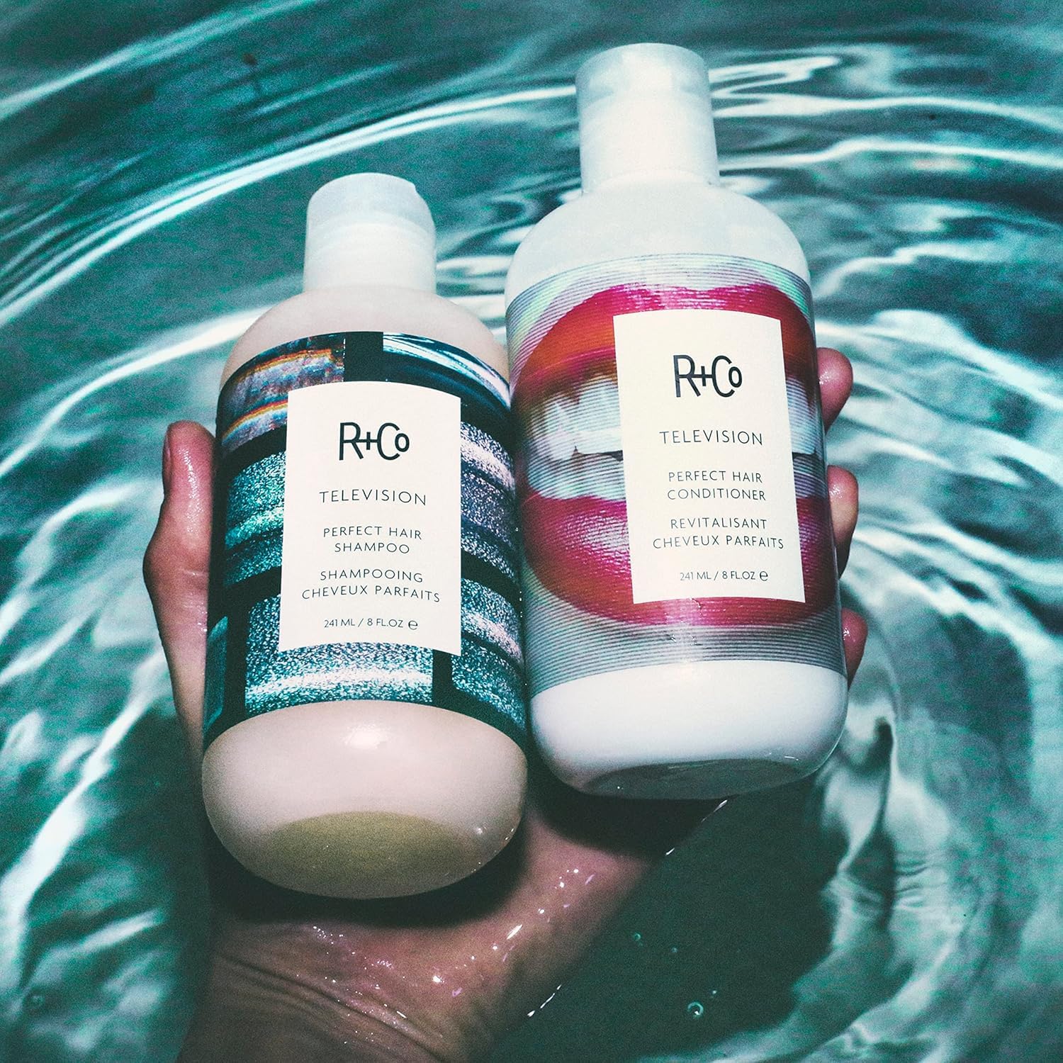 R+Co Television Perfect Hair product being applied for frizz control and manageability