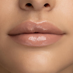 Radiant Professional Lip Glaze applicator demonstrates smooth, even application