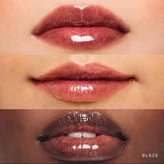 Rare Beauty Blaze gloss swatches showing prismatic shimmer for a glass-like lip finish.