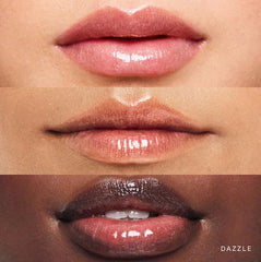 Rare Beauty Dazzle lip gloss swatch reveals sheer blue with multicolor shimmer for luminous lips.