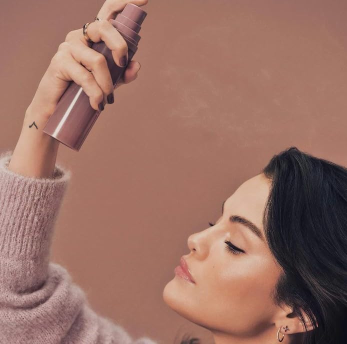 Rare Beauty Find Comfort fragrance mist in use for quick refresh.