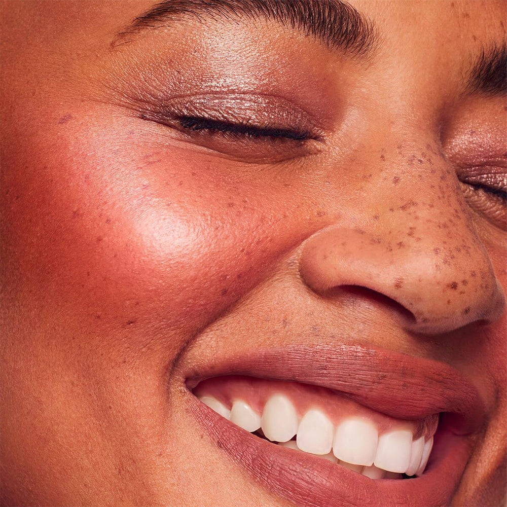 Rare Beauty glow application demo showing buildable dew on cheeks.