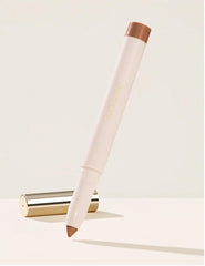 Rare Beauty Growth eyeshadow stick swatch shows creamy pigment for lining and shading.