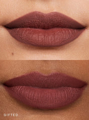 Gifted lip liner being applied along lip line for definition