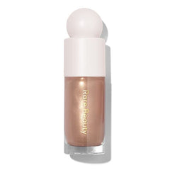 Rare Beauty Transcend micro-pearls detail catching light for a dewy finish