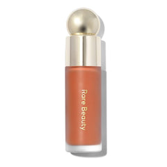 Rare Beauty Soft Pinch Joy bottle close-up for weightless, long-lasting color.