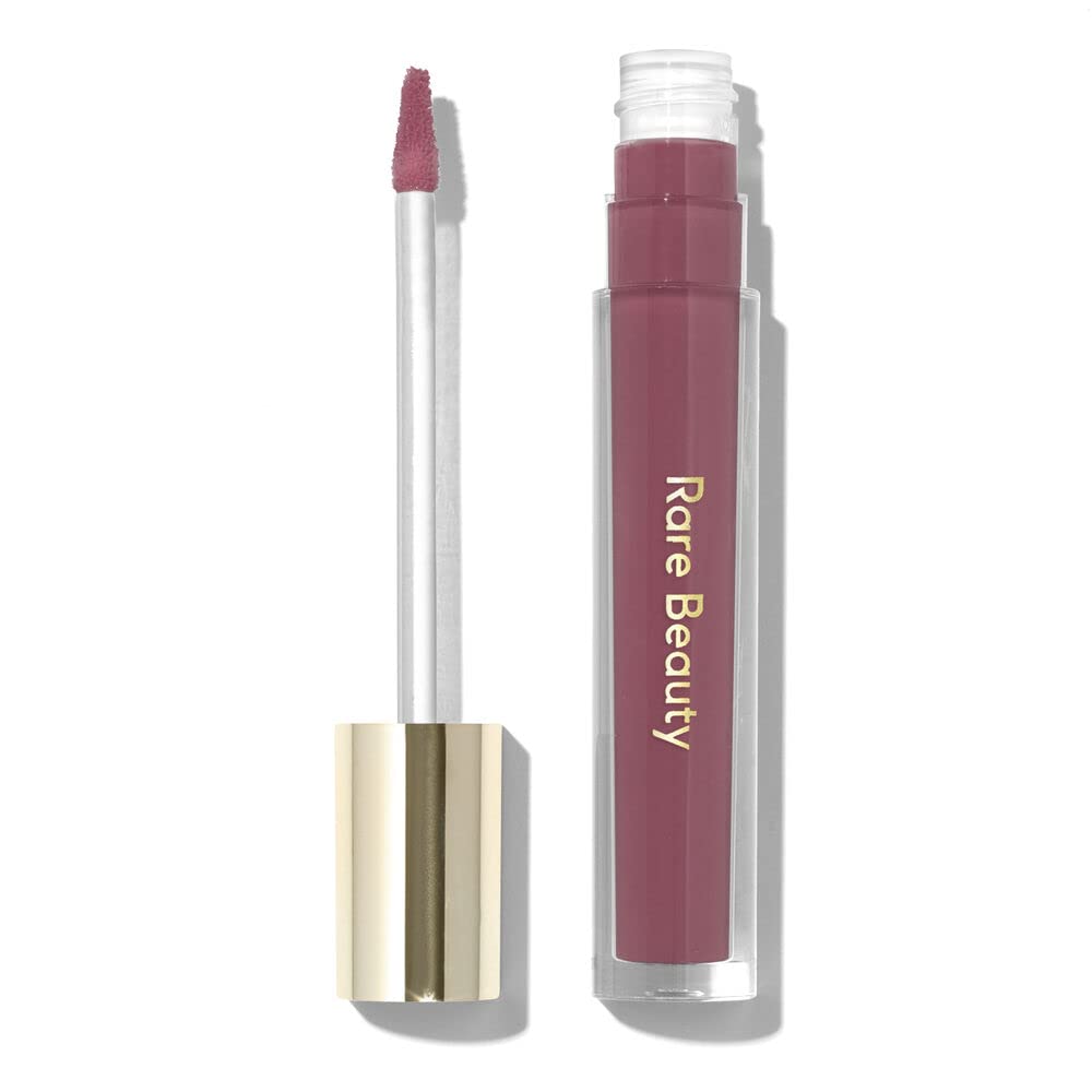 Rare Beauty Stay Vulnerable lip balm tube in nearly mauve for hydrating shine.