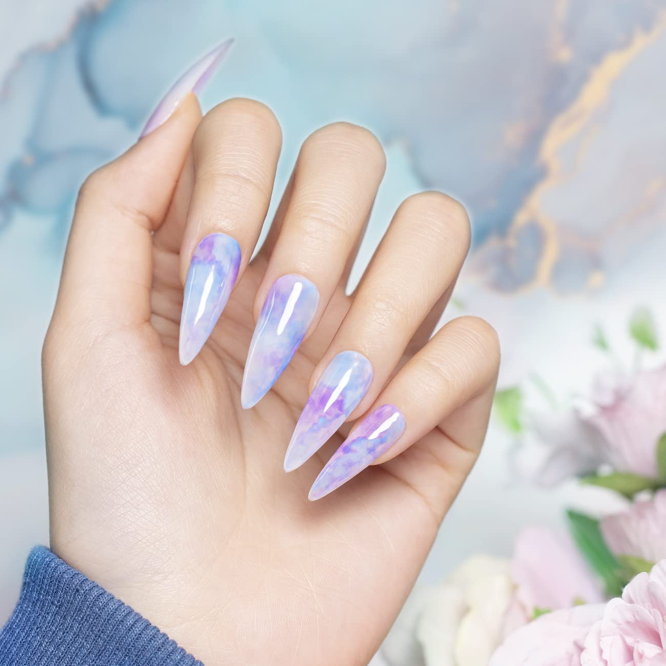 RARJSM Blooming Gel Watercolor nail art blends soft colors for gentle designs.