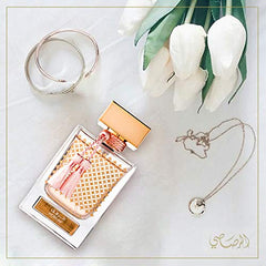 RASASI Qasamat Morhaf heart notes reveal damask rose and geranium for a luxe feel.