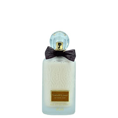 Rasasi Tawahuj bottle closeup highlighting velvet and amber notes