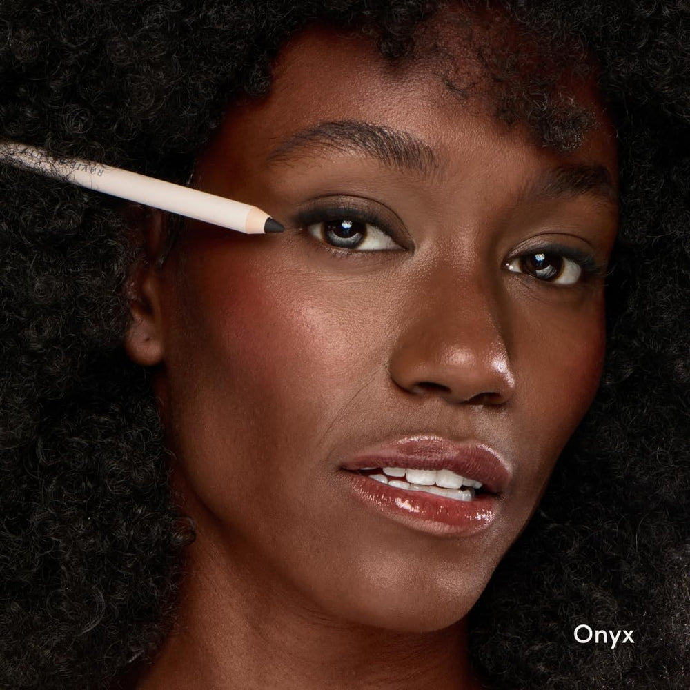 Ravie Beauty Eyeliner Onyx pencil gliding along lash line for natural definition
