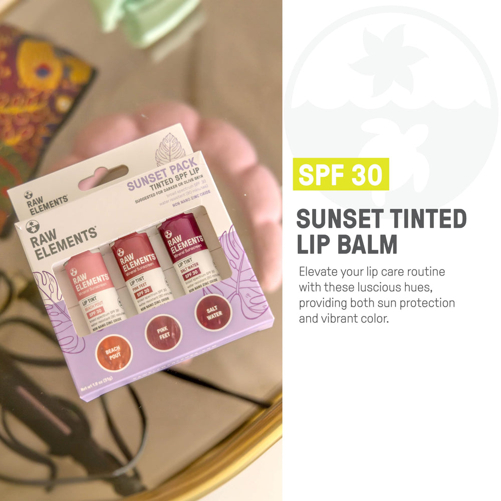 Raw Elements Tinted Lip Beach Pout being applied as a glossy pink lip finish.