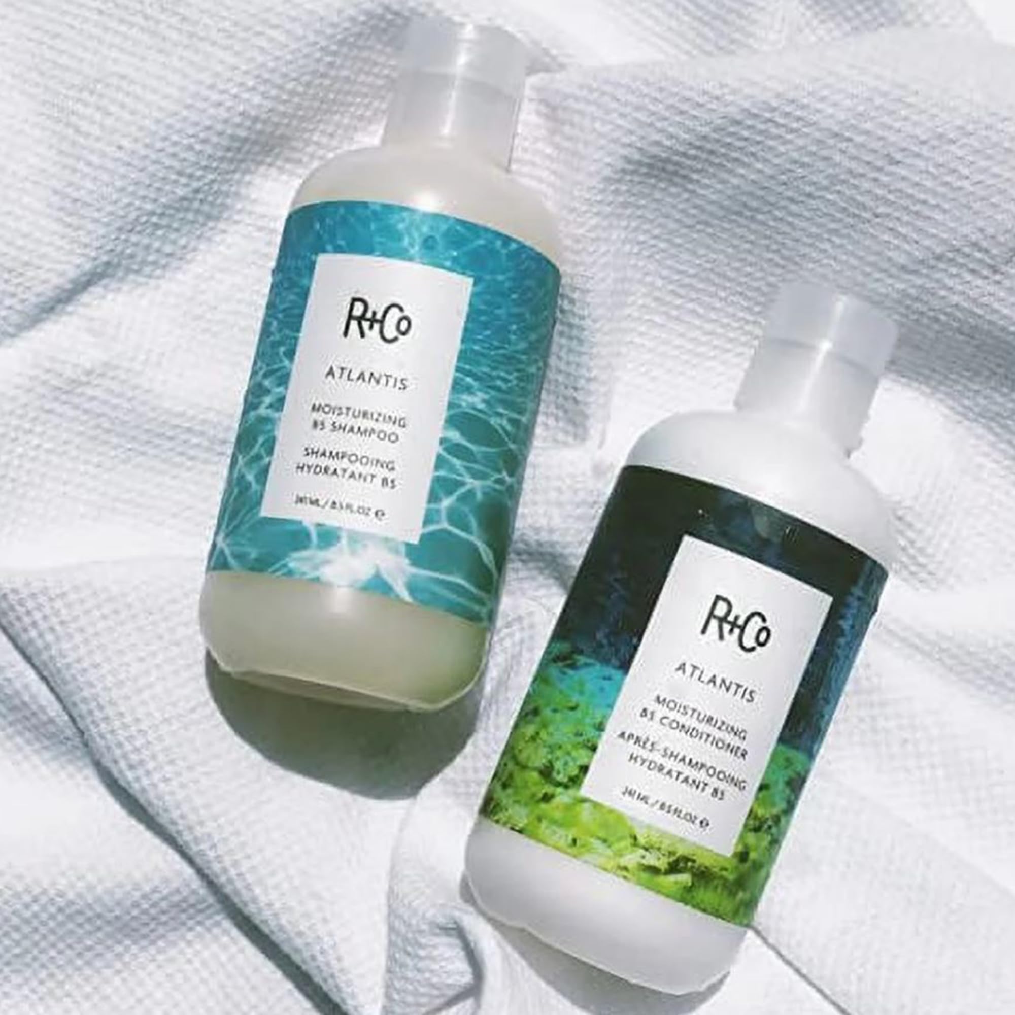 R+Co Atlantis bathroom routine scene suggests easy daily use