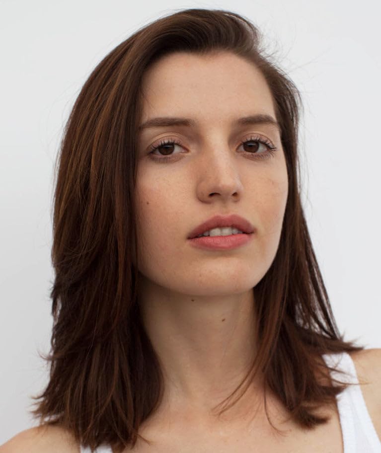 R+Co Atlantis hair nourishment application shows smooth styling prep.