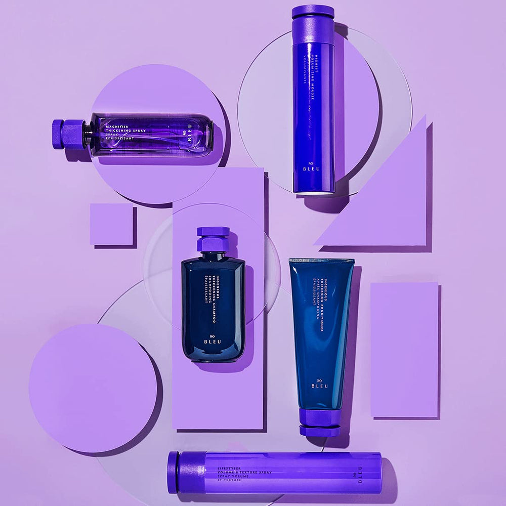 R+Co Blue bottle close-up emphasizes memory and glossy finish