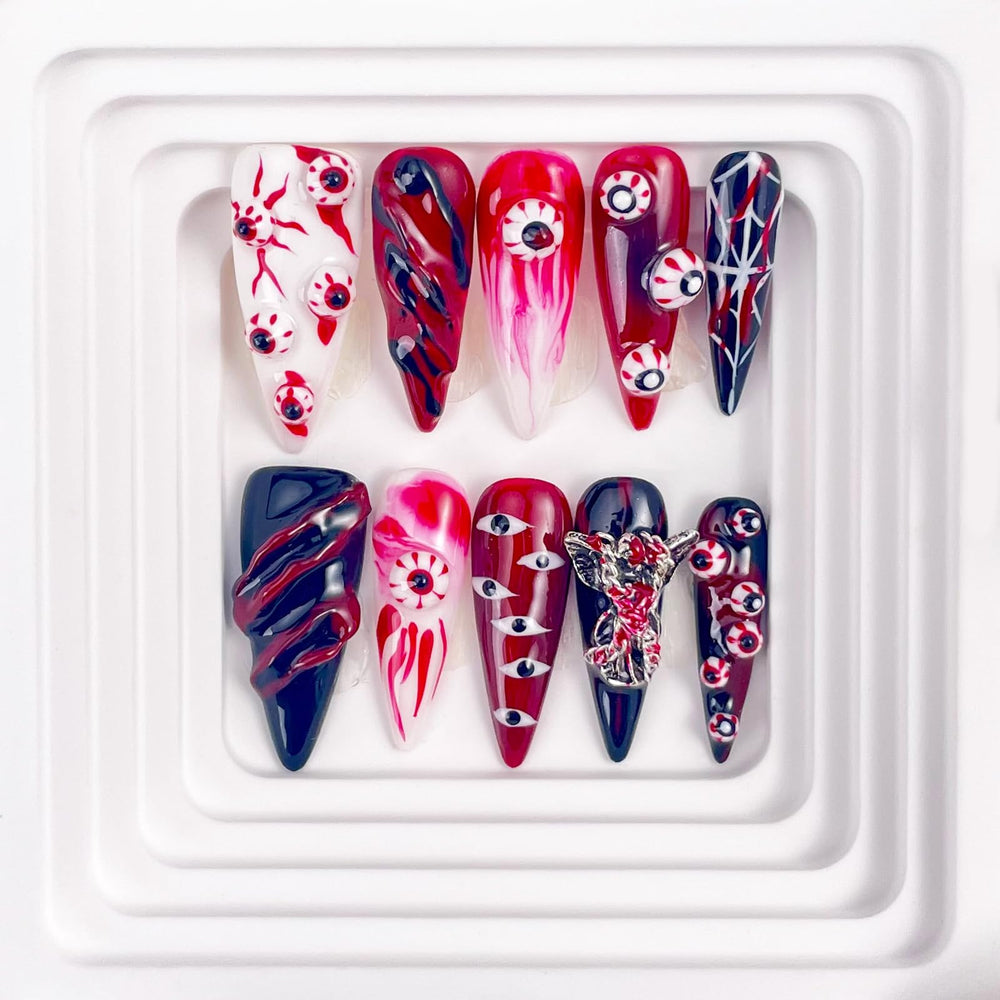 RDNTBEU Halloween nails with evil eyes for dramatic evening look